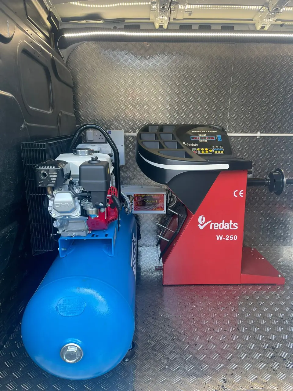 Redats W-250 wheel balancing machine inside the Lux Tyres mobile van