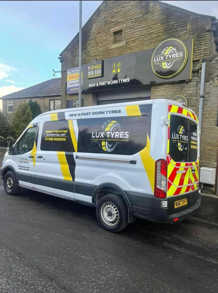 Lux Tyres van parked outside the shop in Halifax - serving Wakefield